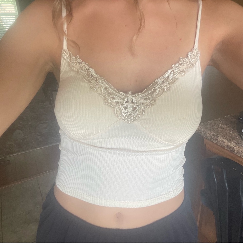 Elegant Cream Ribbed Camisole with Lace